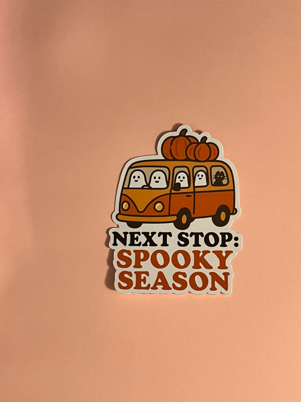 Next Stop: Spooky Season Sticker – Halloween Bus with Ghost Passengers Vinyl Sticker