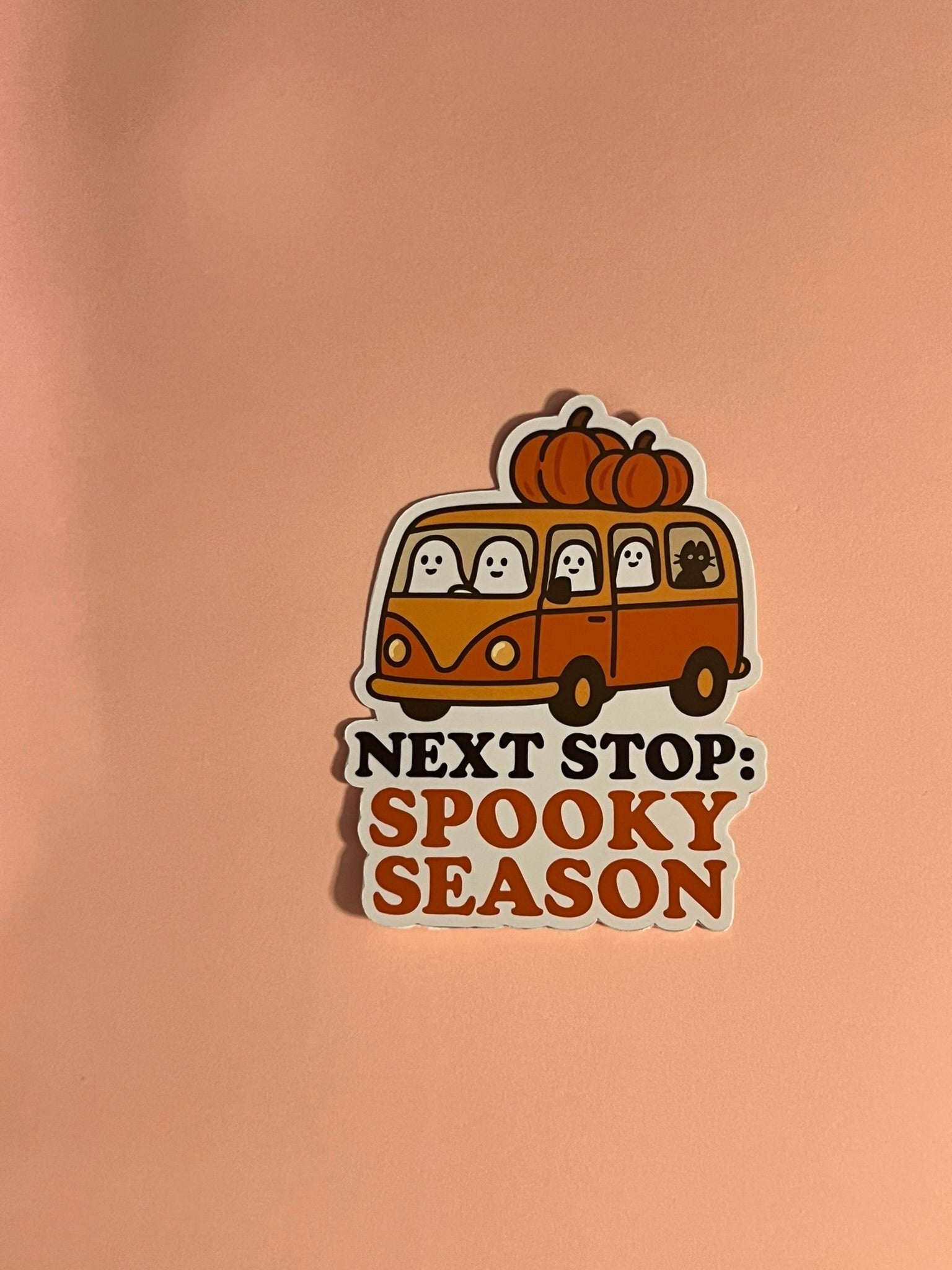 Next Stop: Spooky Season Sticker – Halloween Bus with Ghost Passengers Vinyl Sticker