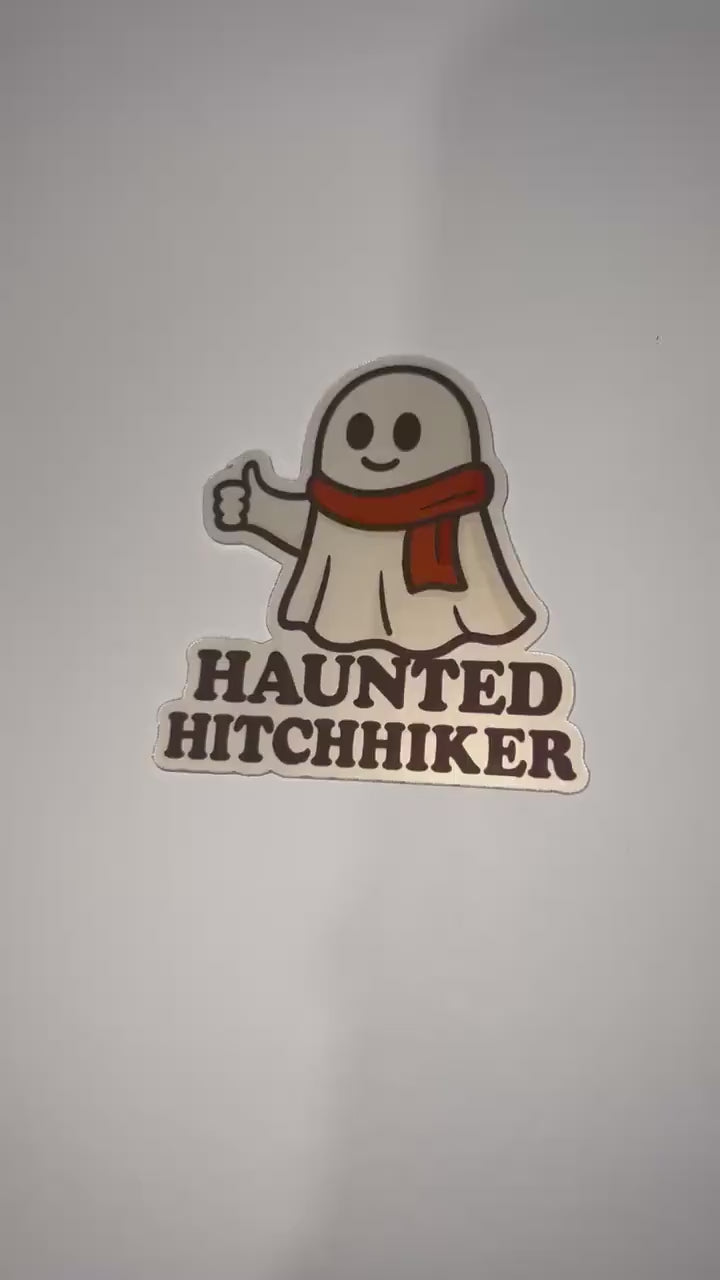 Haunted Hitchhiker Sticker – Cozy Ghost with Scarf Vinyl Sticker